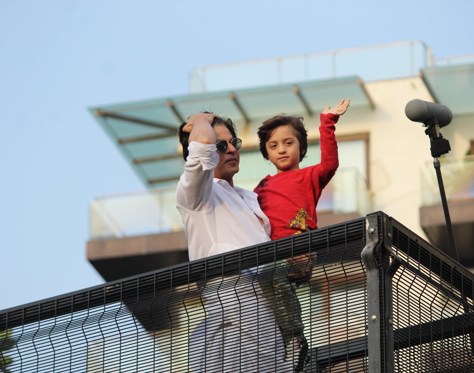 Shahrukh Khan With His Son AbRam Khan During A Fan Meet From House Balcony