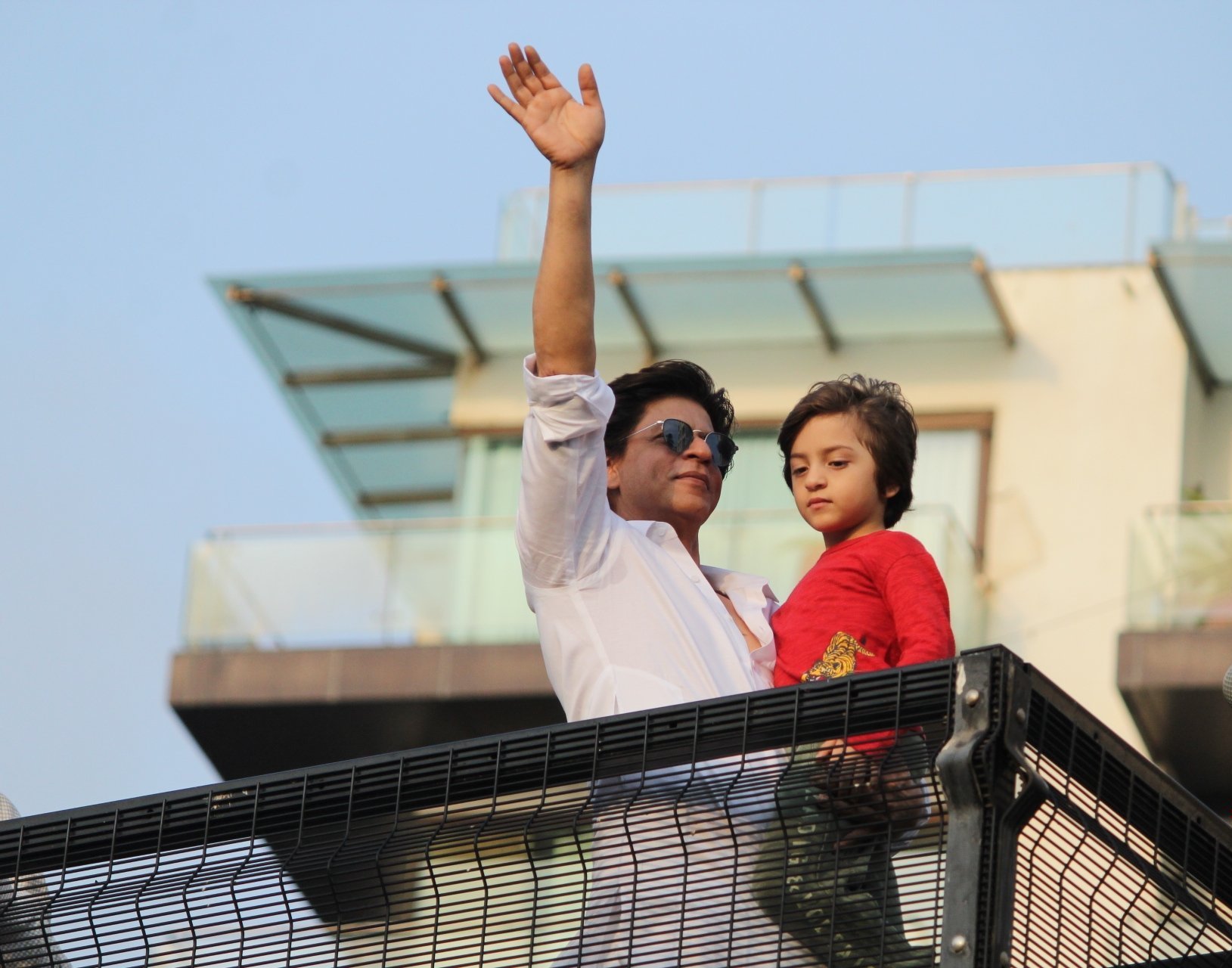 Shahrukh Khan With His Son AbRam Khan During A Fan Meet From House Balcony