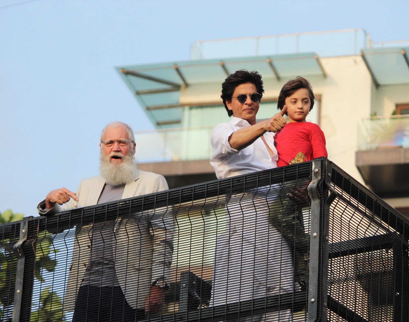 Shahrukh Khan With His Son AbRam Khan During A Fan Meet From House Balcony