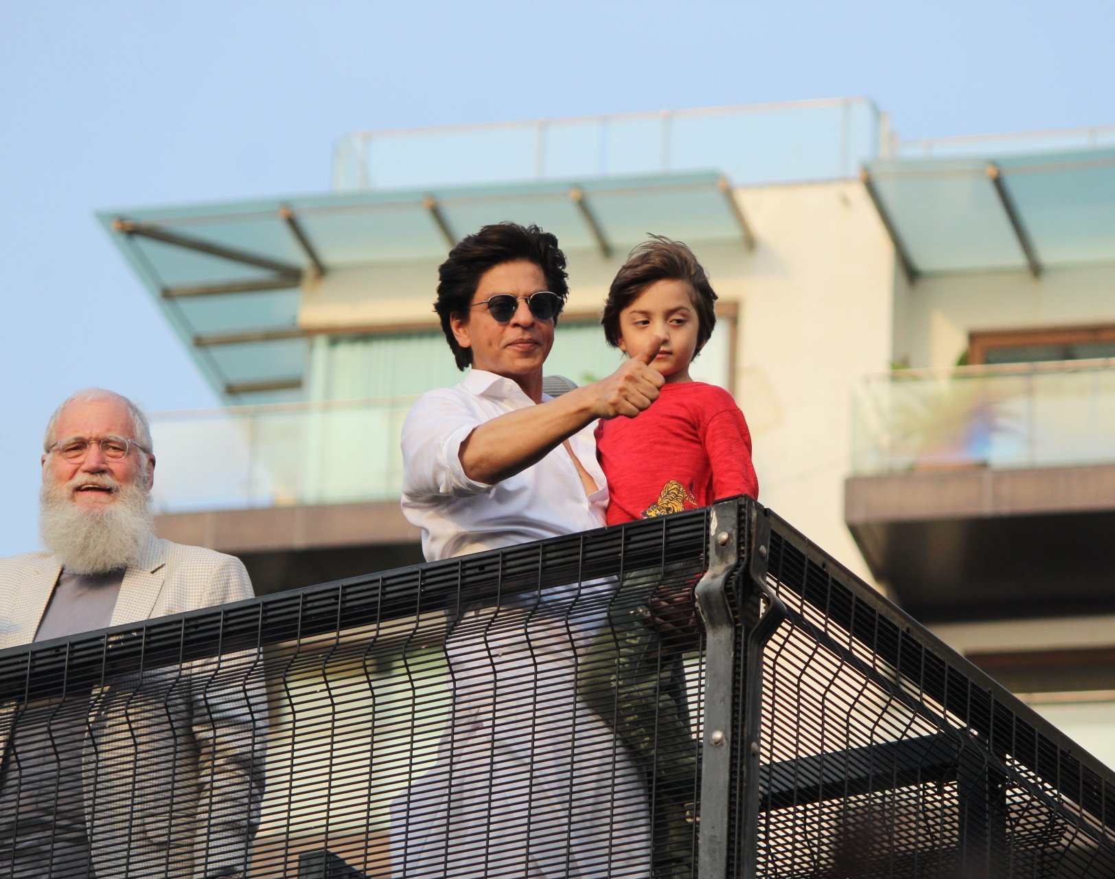 Shahrukh Khan With His Son AbRam Khan During A Fan Meet From House Balcony