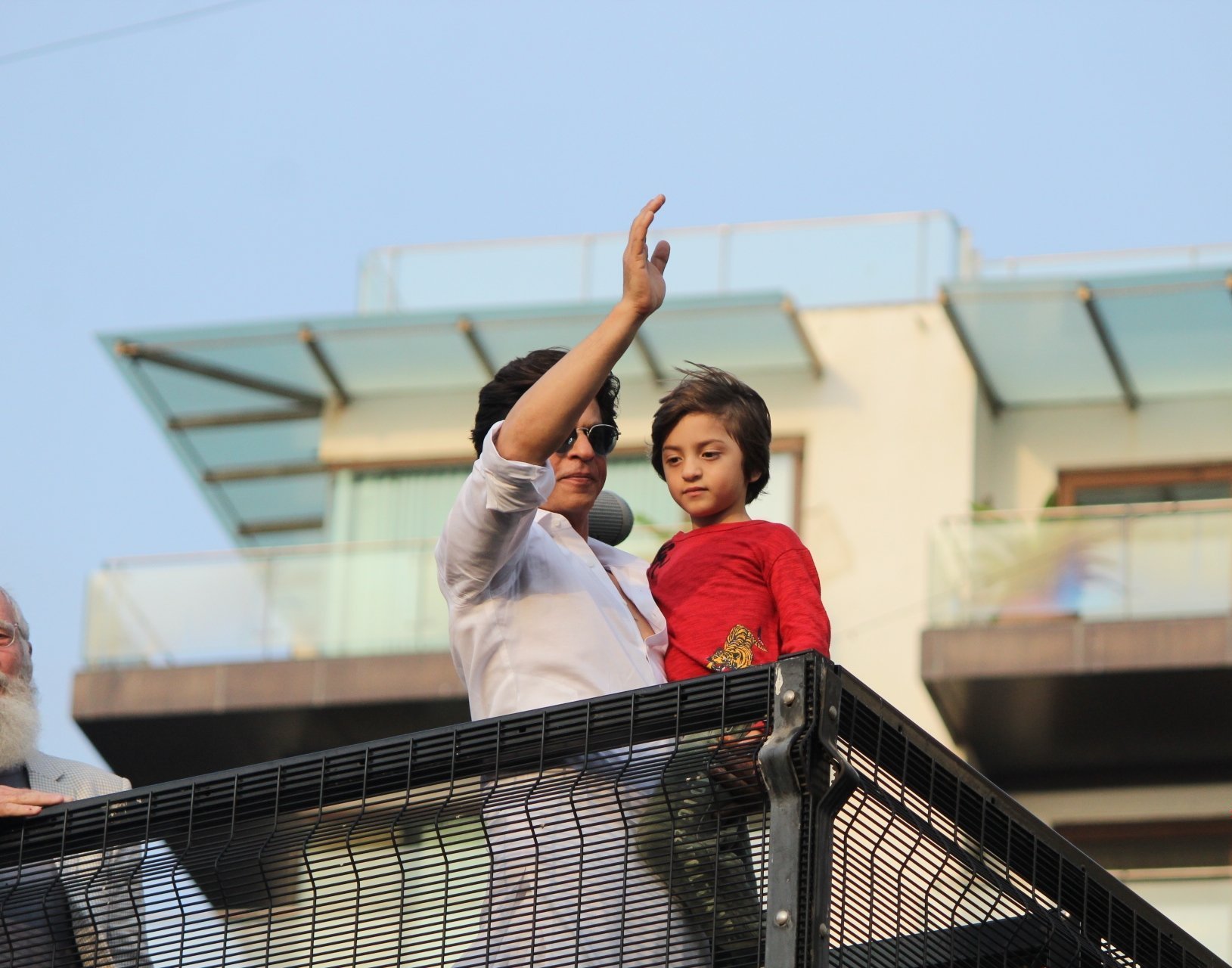 Shahrukh Khan With His Son AbRam Khan During A Fan Meet From House Balcony