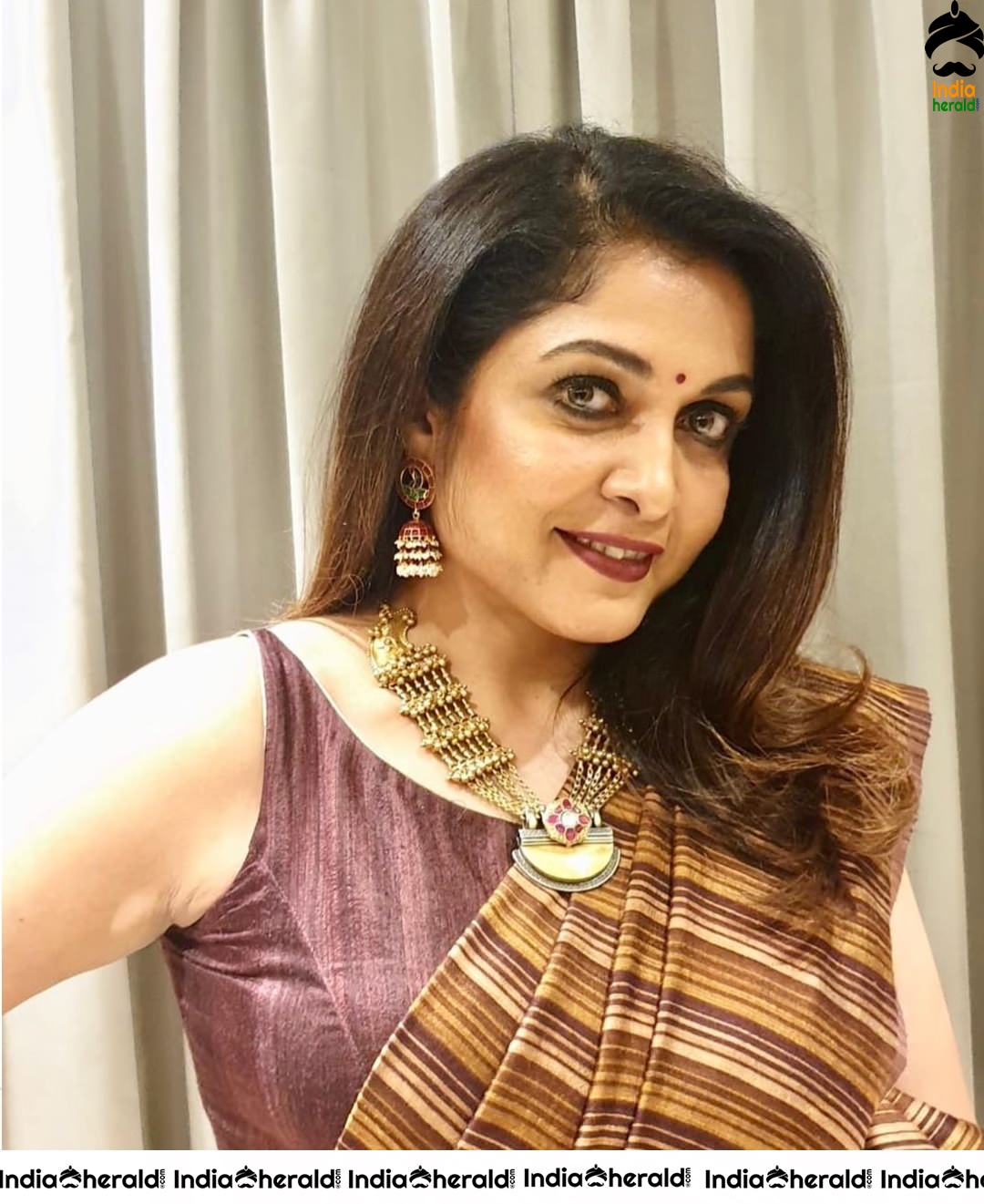 Ramya Krishnan in this grey organza saree is all you need to see today