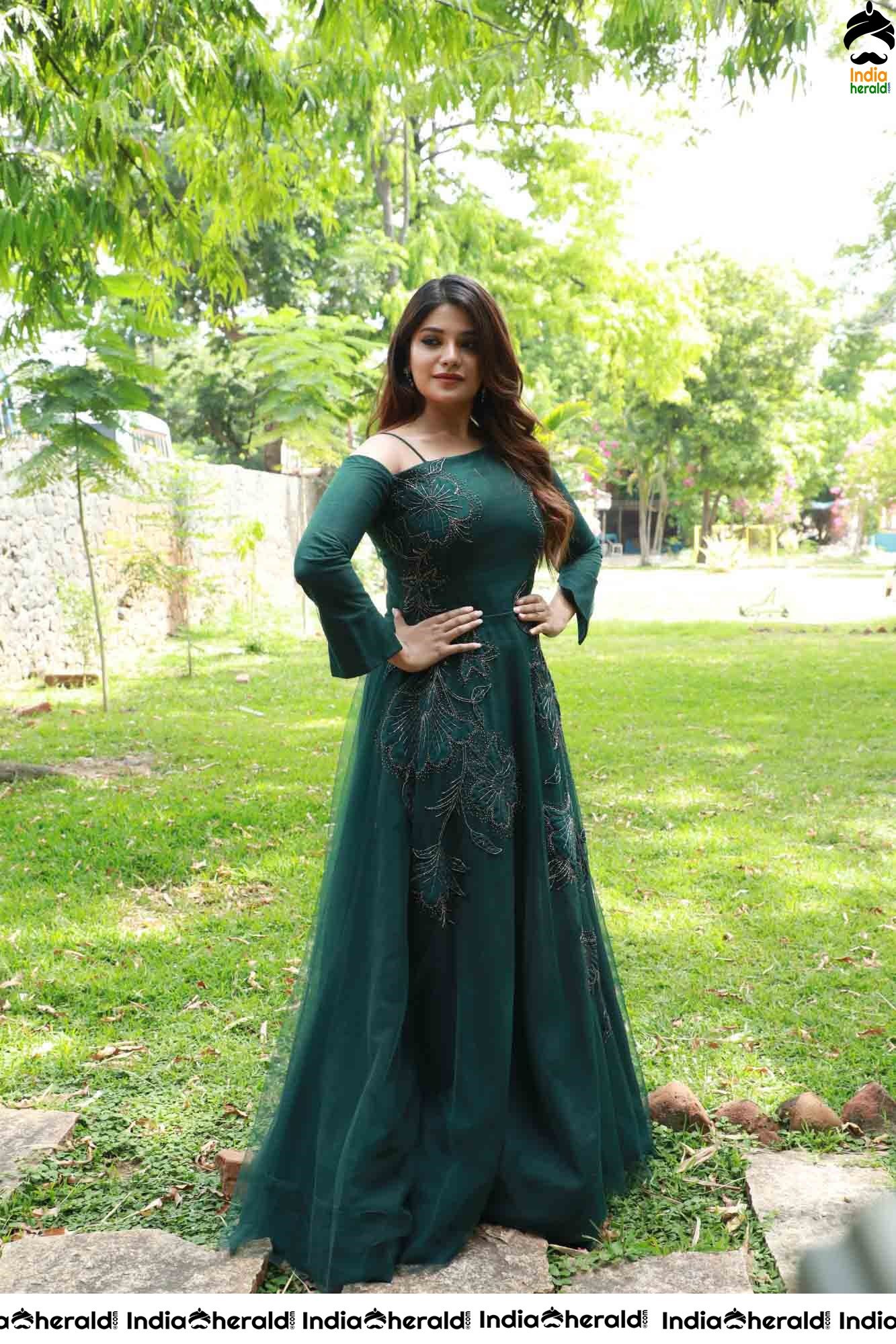 Aathmika Hot Photoshoot Stills in Dark Green Attire Set 1