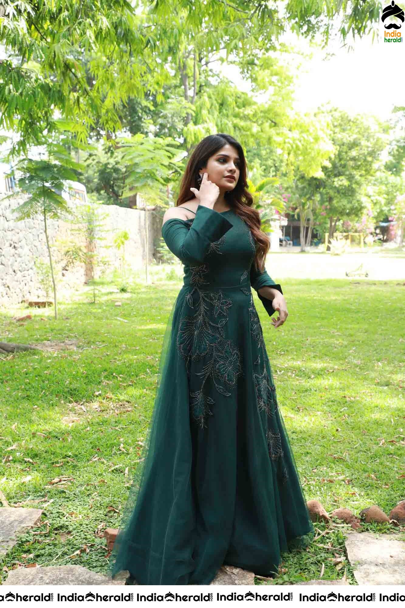 Aathmika Hot Photoshoot Stills in Dark Green Attire Set 1