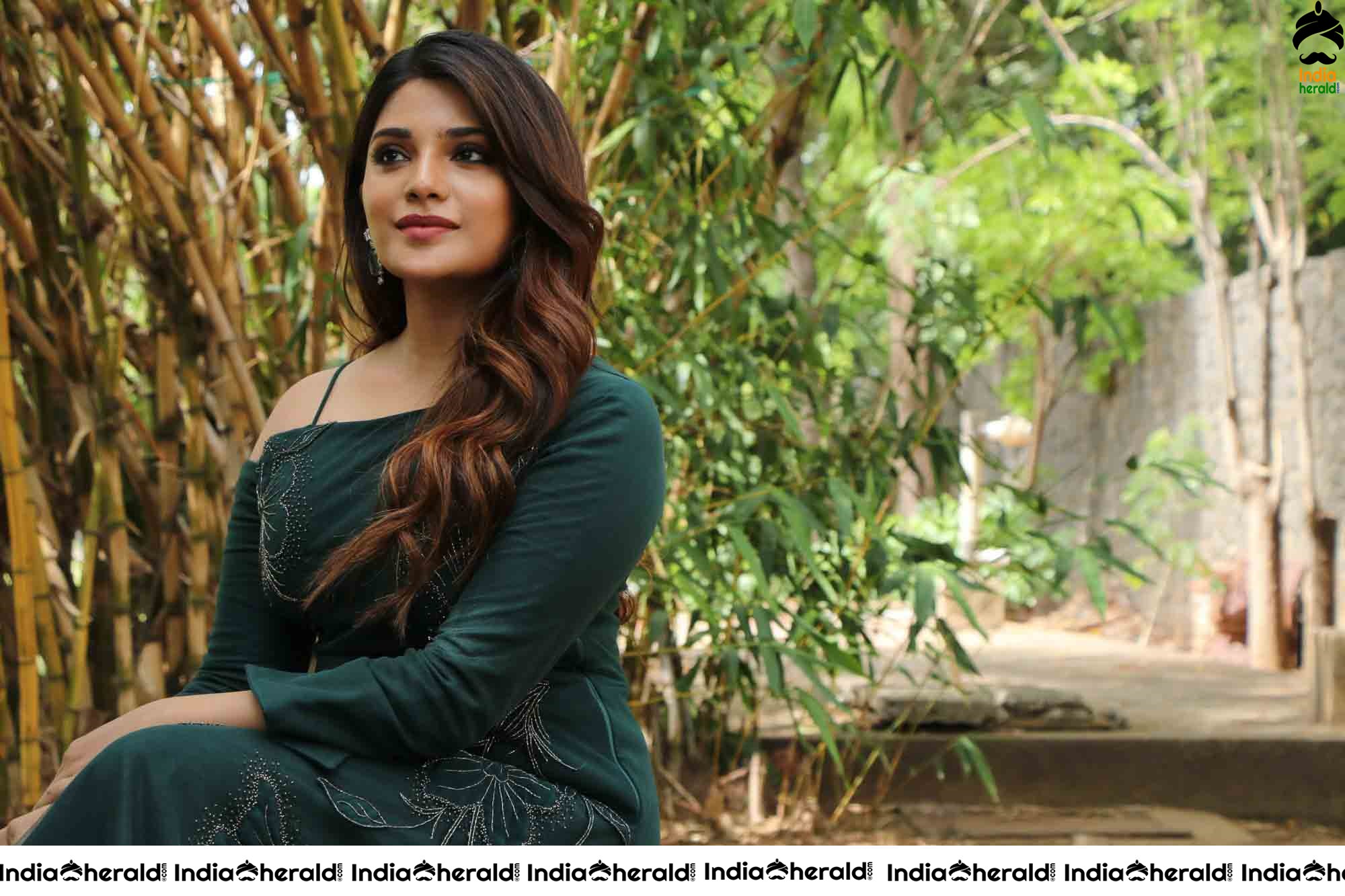 Aathmika Hot Photoshoot Stills in Dark Green Attire Set 2