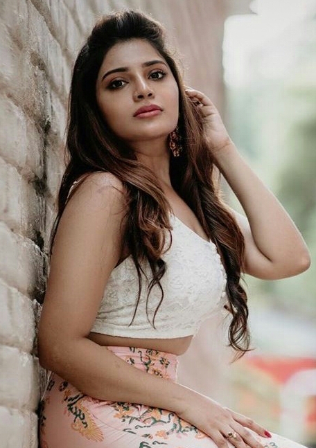 Aathmika Teasing Waistline Hot Photoshoot