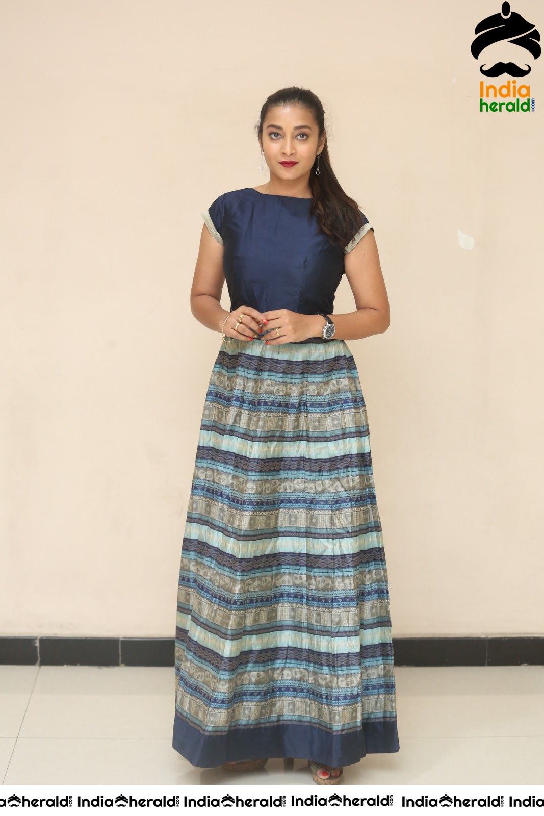 Actress Bhanu Sri Latest Stills in Tight Blue Short Sleeves Set 1