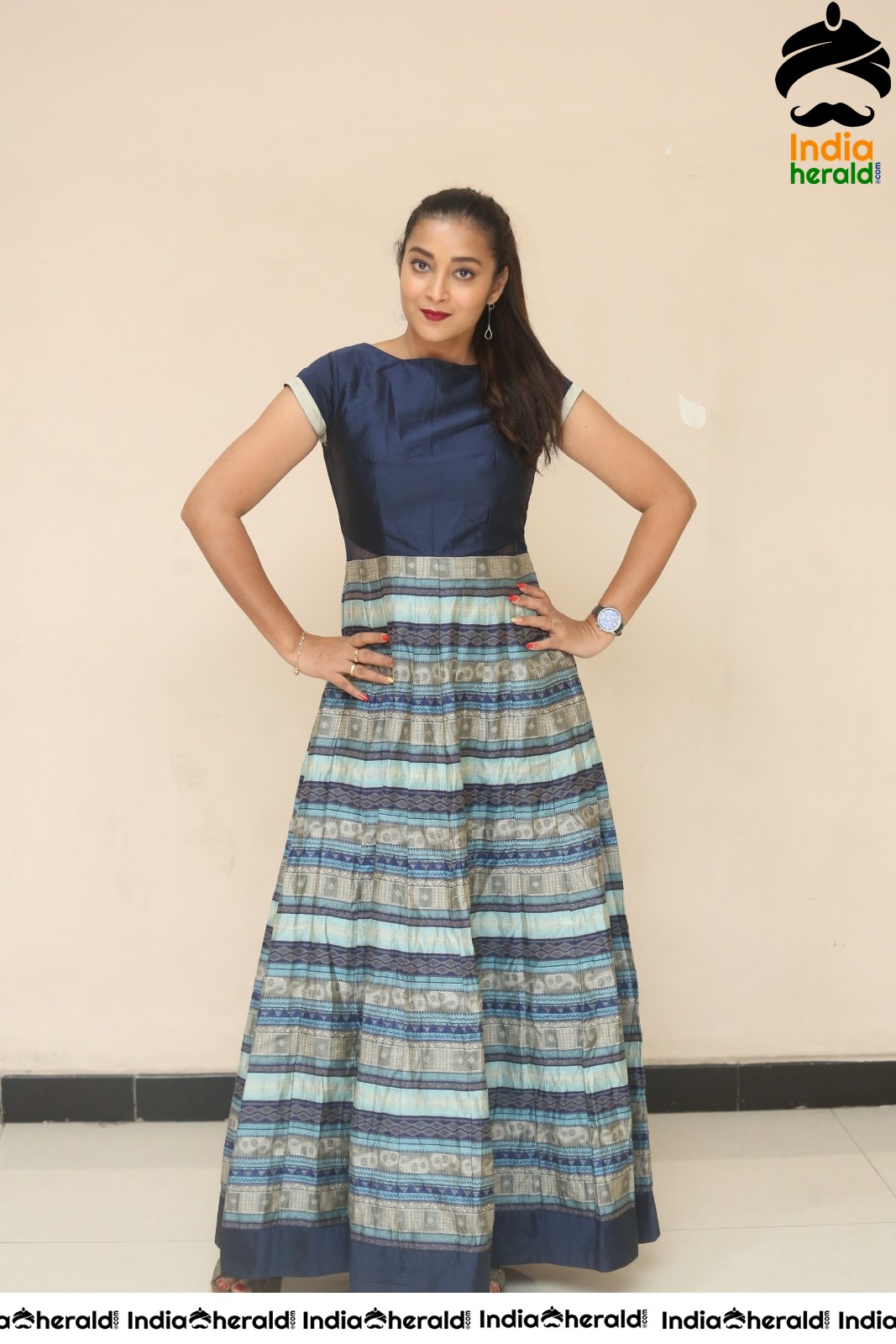 Actress Bhanu Sri Latest Stills in Tight Blue Short Sleeves Set 2