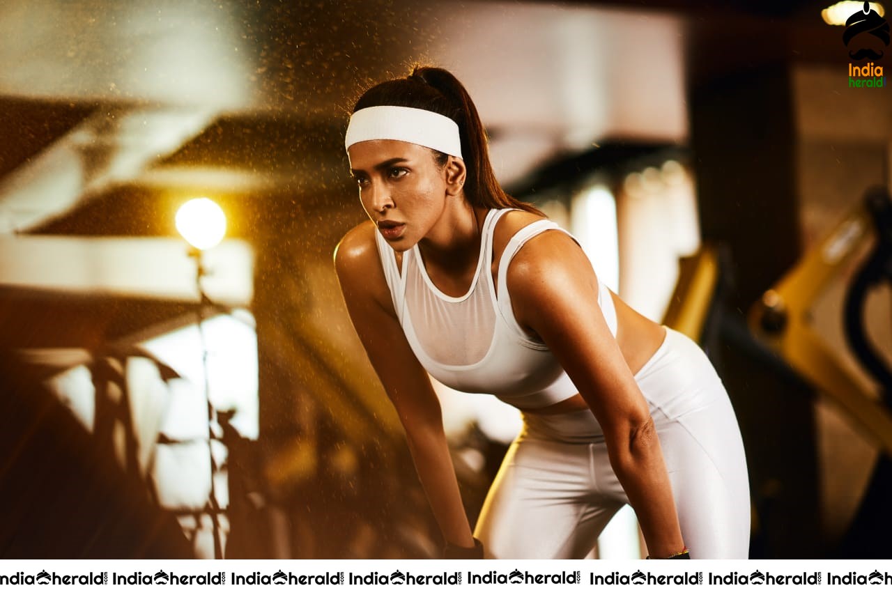 Actress Lakshmi Manchu Hot Stills in Gym