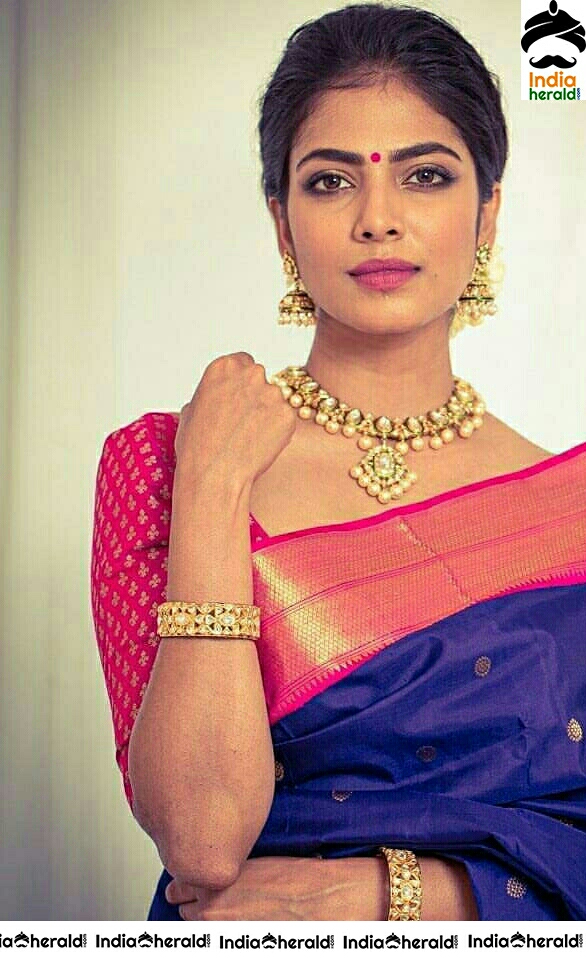Actress Malavika Mohanan Attractive Traditional Stills