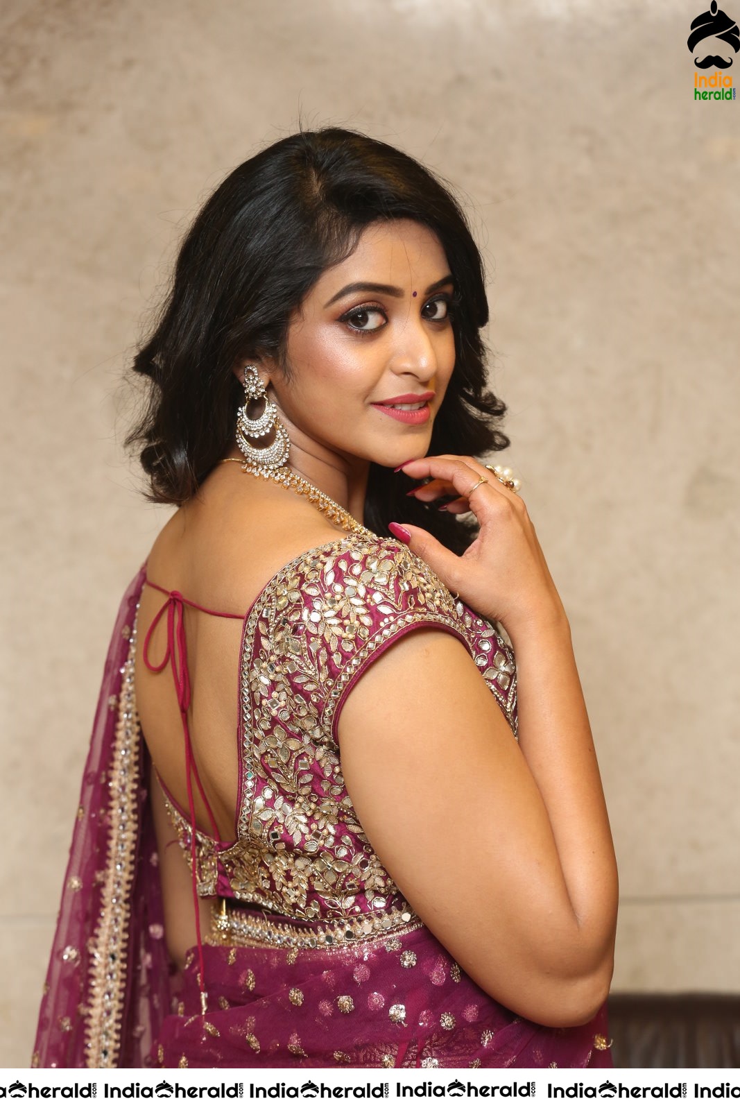 Actress Nakshatra looking pretty in Saree Photoshoot stills