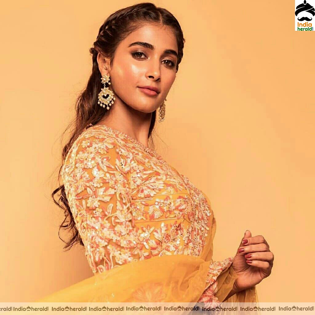 Actress Pooja Hegde Stills Looking Like A Sunflower In Manish Malhotra