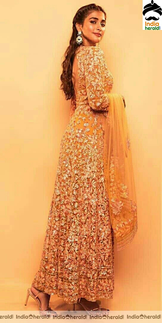 Actress Pooja Hegde Stills Looking Like A Sunflower In Manish Malhotra