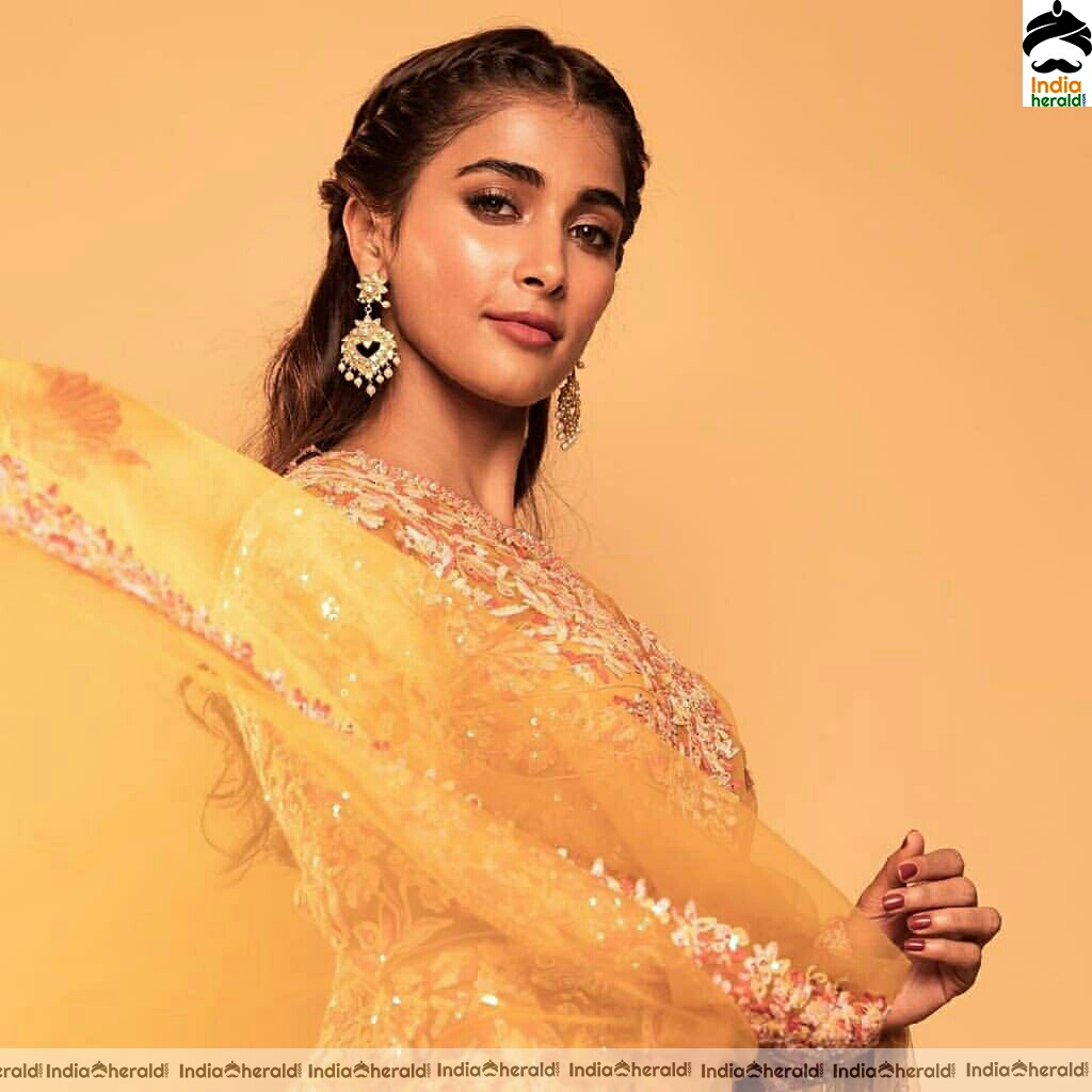 Actress Pooja Hegde Stills Looking Like A Sunflower In Manish Malhotra