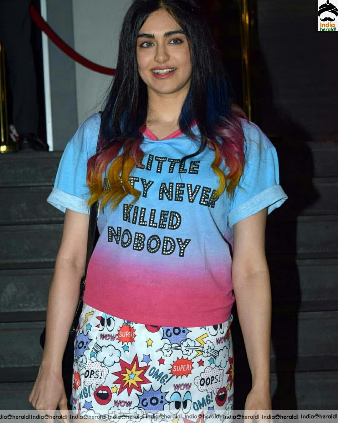 Adah spotted in short skirt and blue tee