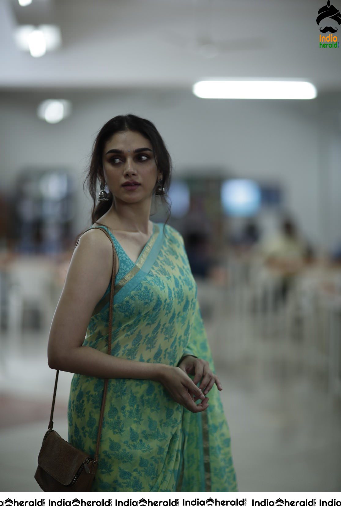 Aditi Rao Mesmerizes in Sleeveless Blouse and Saree Looks