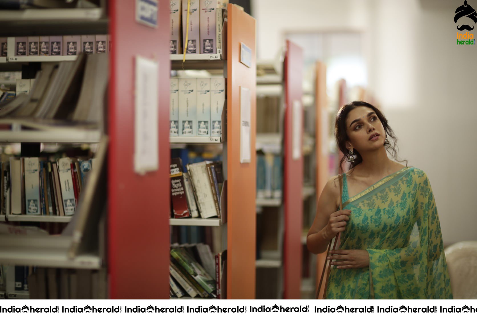 Aditi Rao Mesmerizes in Sleeveless Blouse and Saree Looks