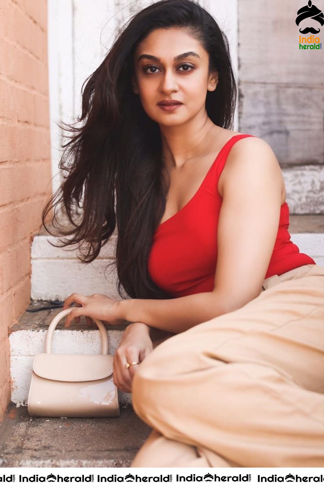Aishwarya Arjun in Red Sleeveless Banian and she is too hot