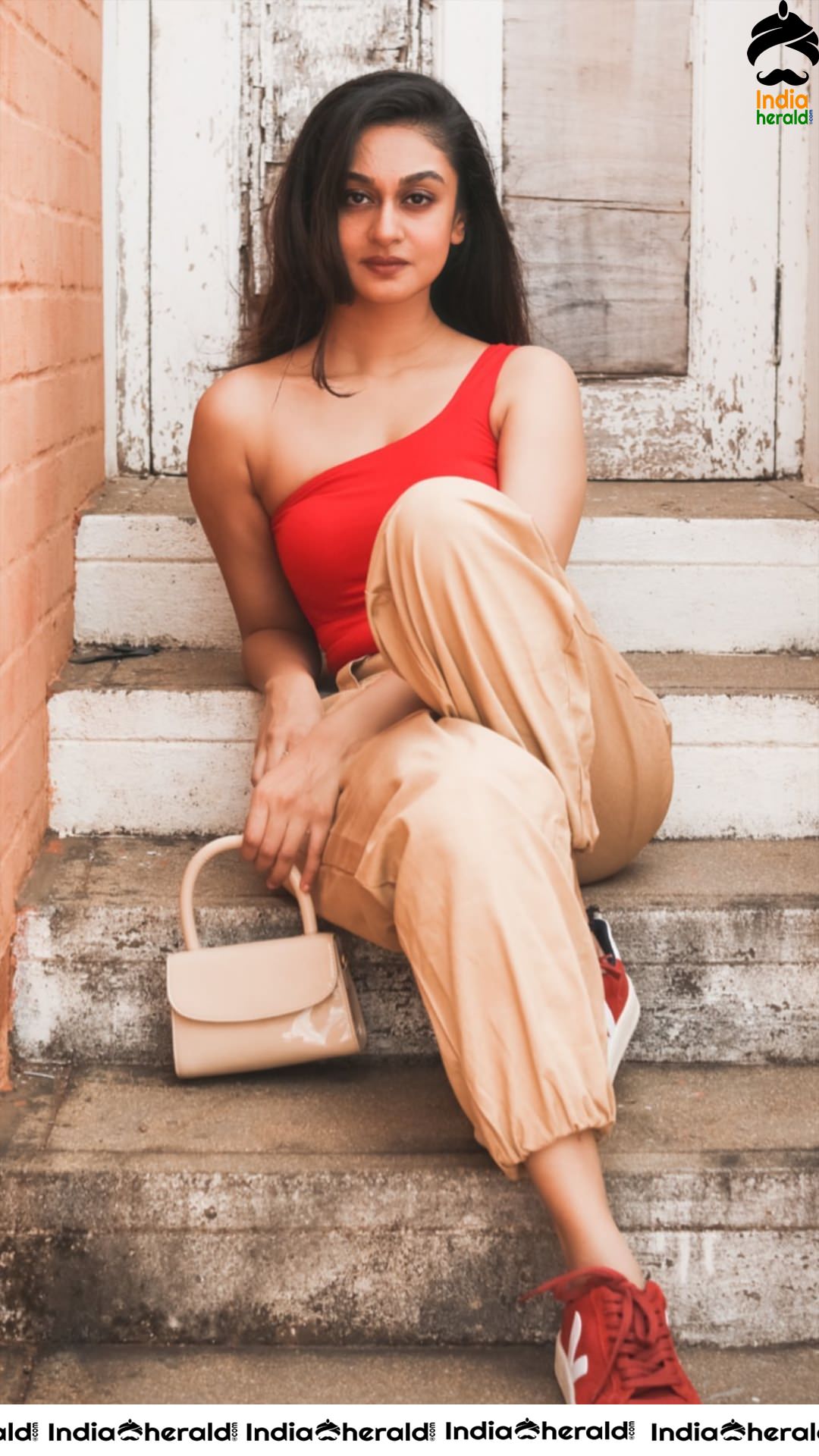 Aishwarya Arjun in Red Sleeveless Banian and she is too hot