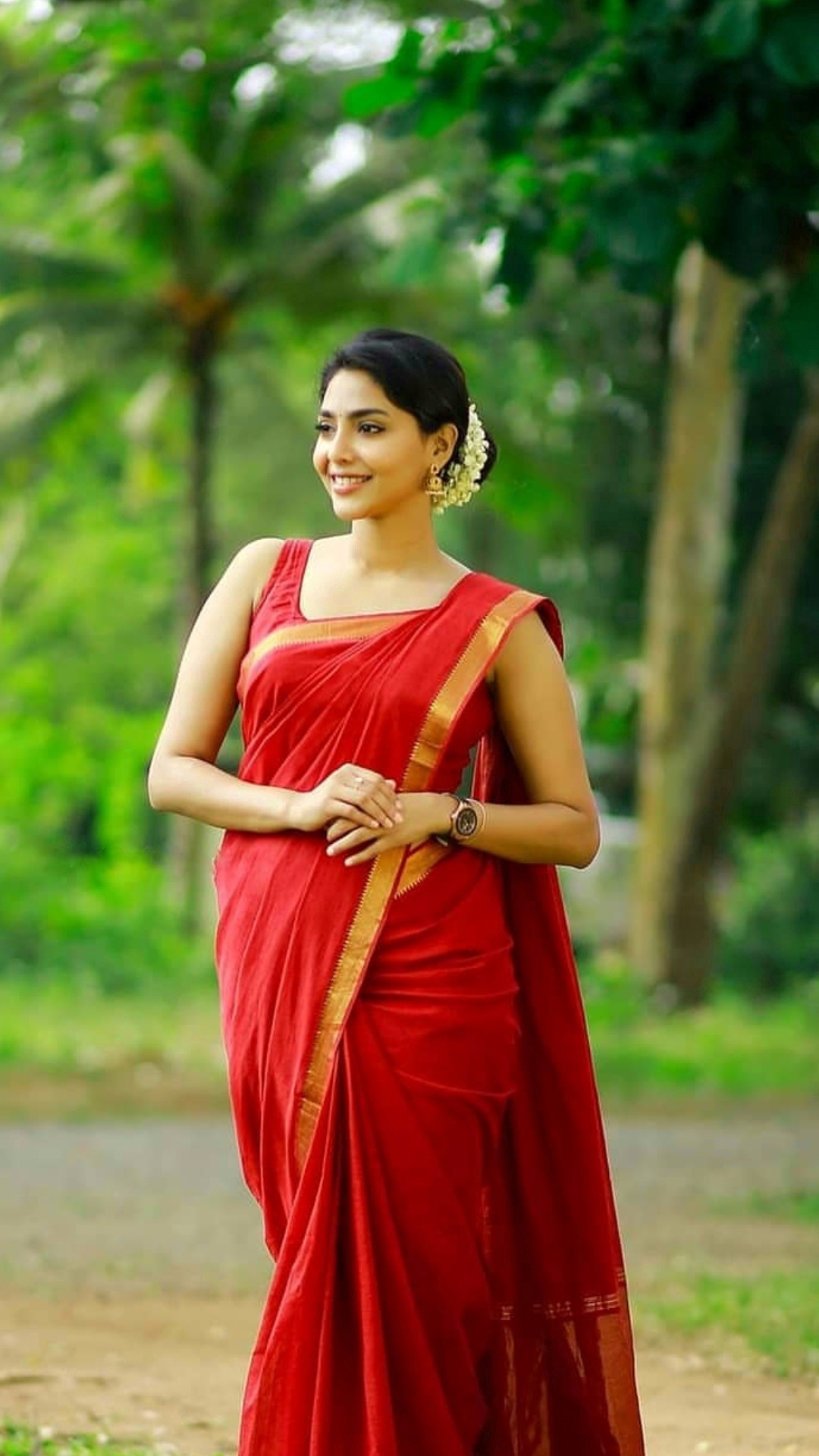 Aishwarya Lakshmi Latest Stills In Red Saree And Sleeveless Blouse