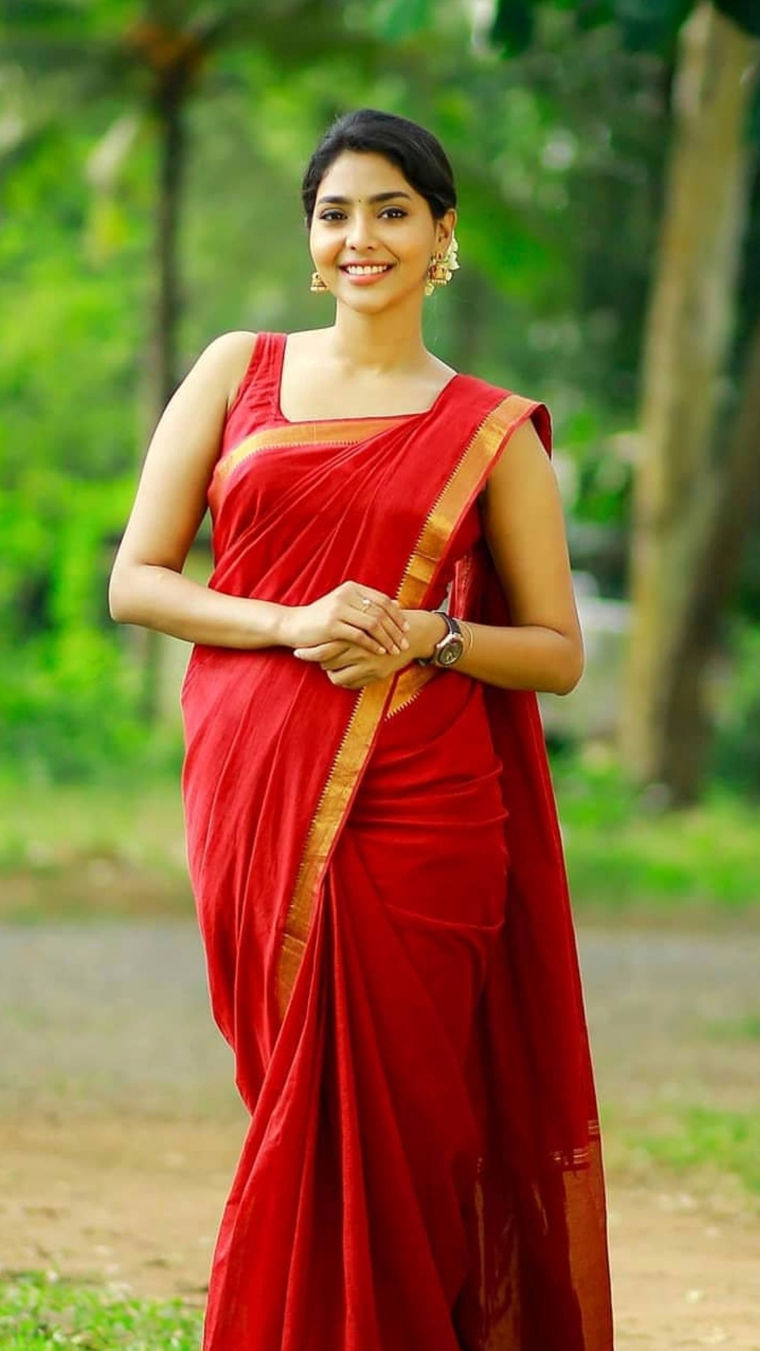 Aishwarya Lakshmi Latest Stills In Red Saree And Sleeveless Blouse