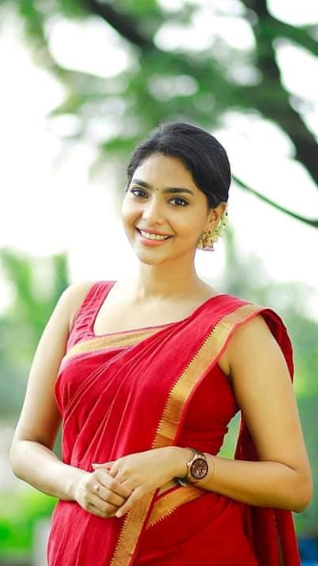 Aishwarya Lakshmi Latest Stills In Red Saree And Sleeveless Blouse