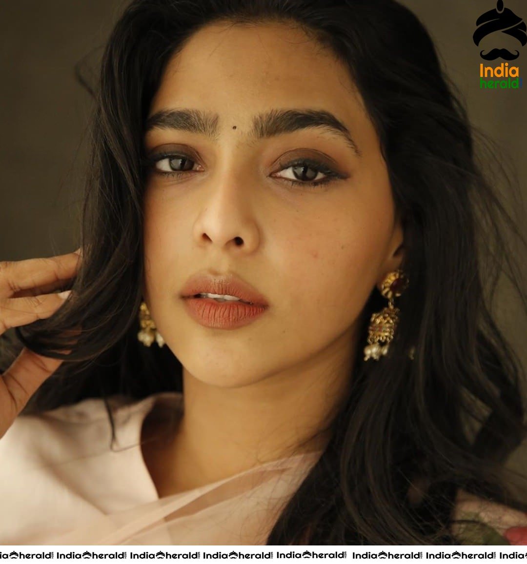 Aishwarya Lekshmi Hot in White Saree for the promotions of her Tamil debut Action