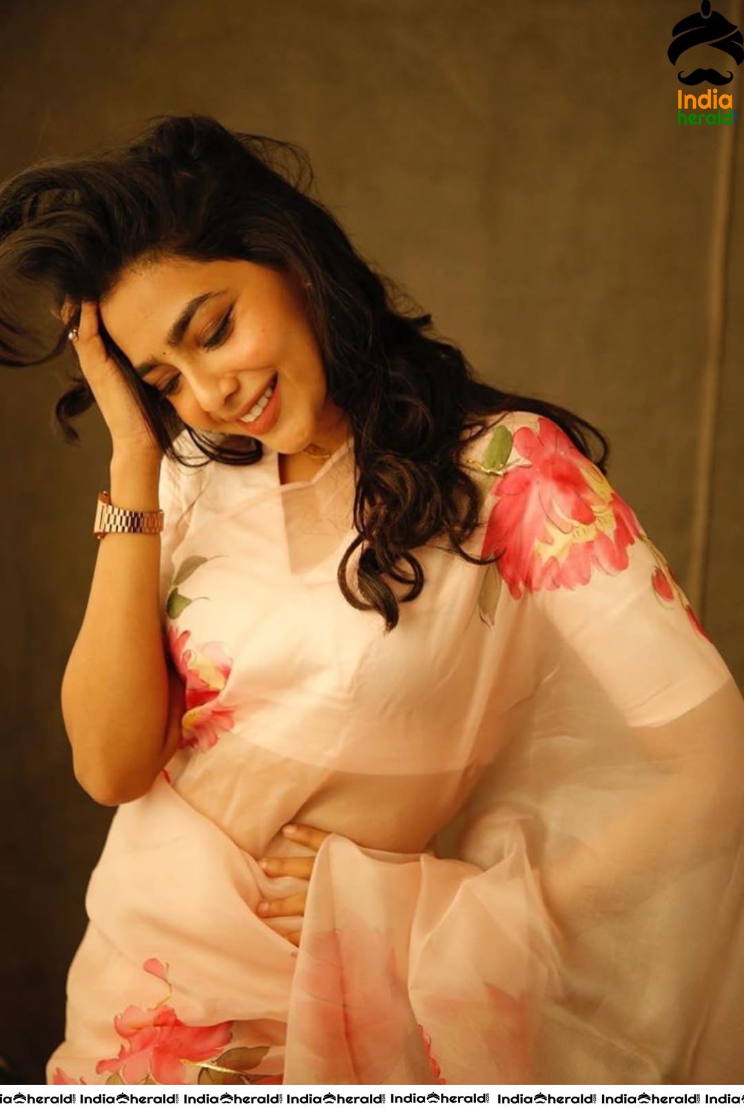 Aishwarya Lekshmi Hot in White Saree for the promotions of her Tamil debut Action