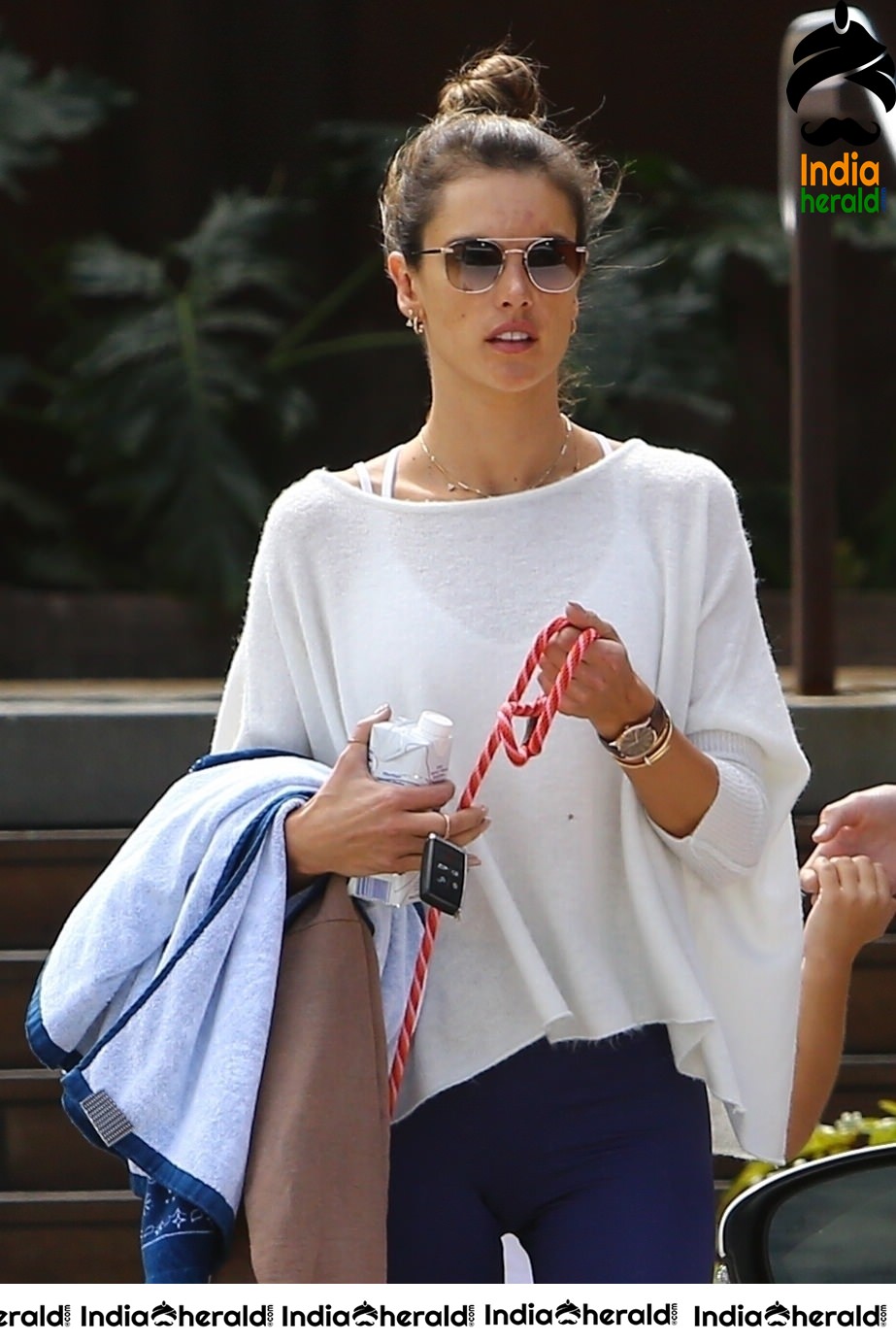 Alessandra Ambrosio walks with her dog and caught by Paparazzi in Malibu