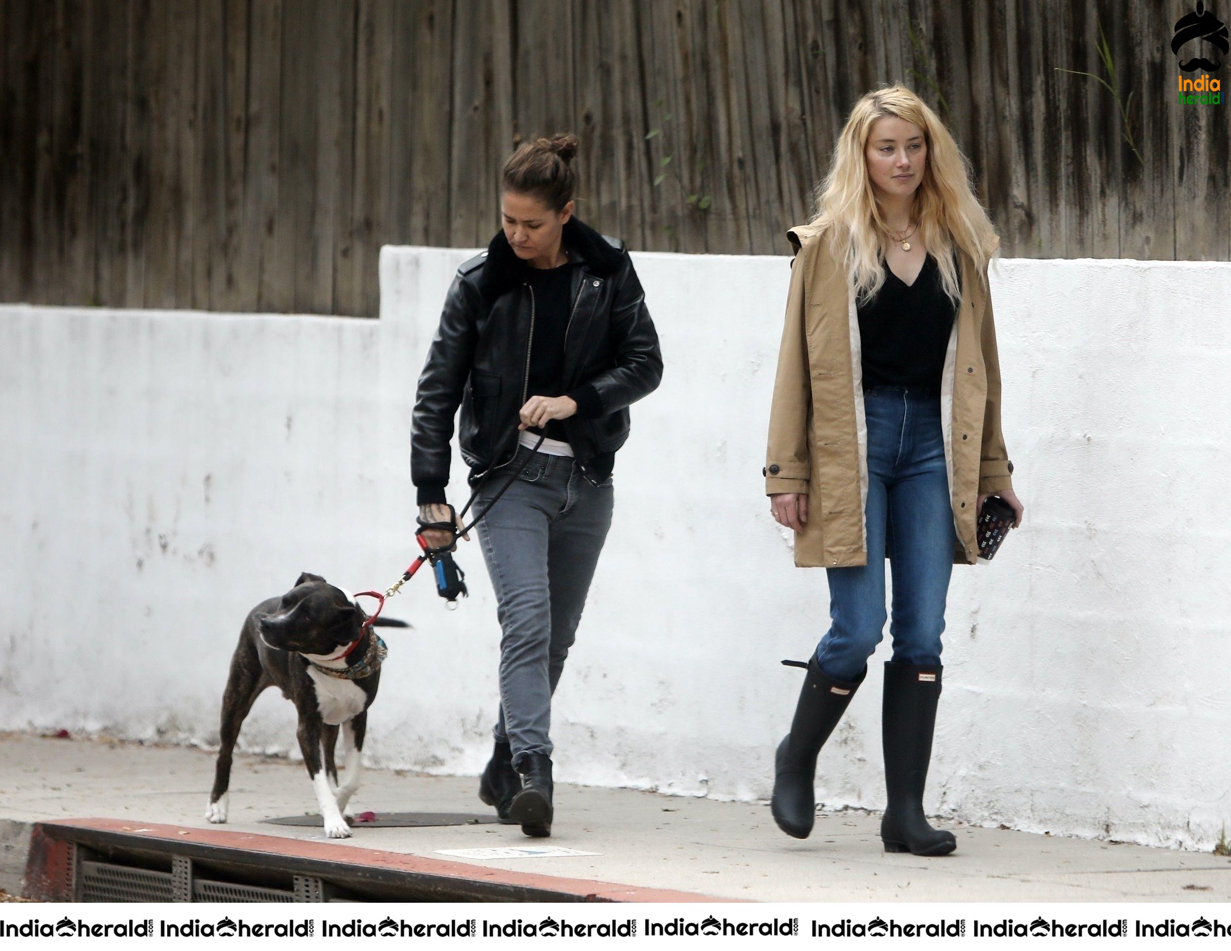 Amber Heard takes a break from isolation to walk Birdie with girlfriend Bianca Butti in LA