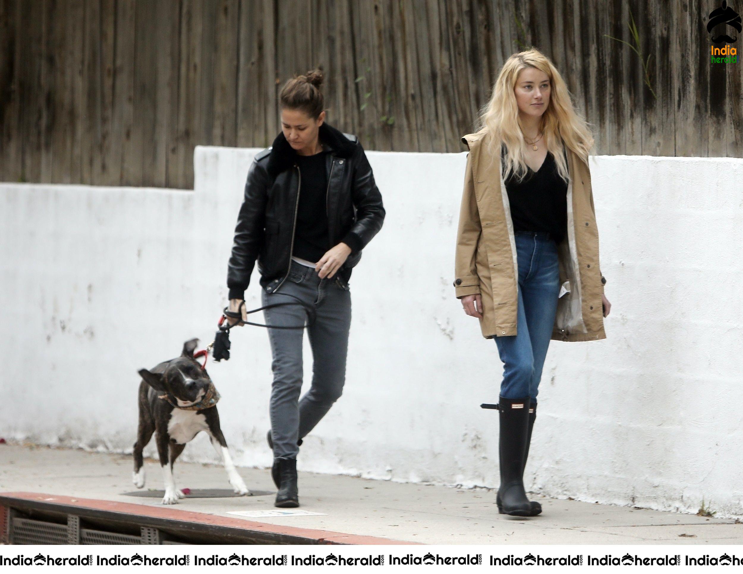 Amber Heard takes a break from isolation to walk Birdie with girlfriend Bianca Butti in LA