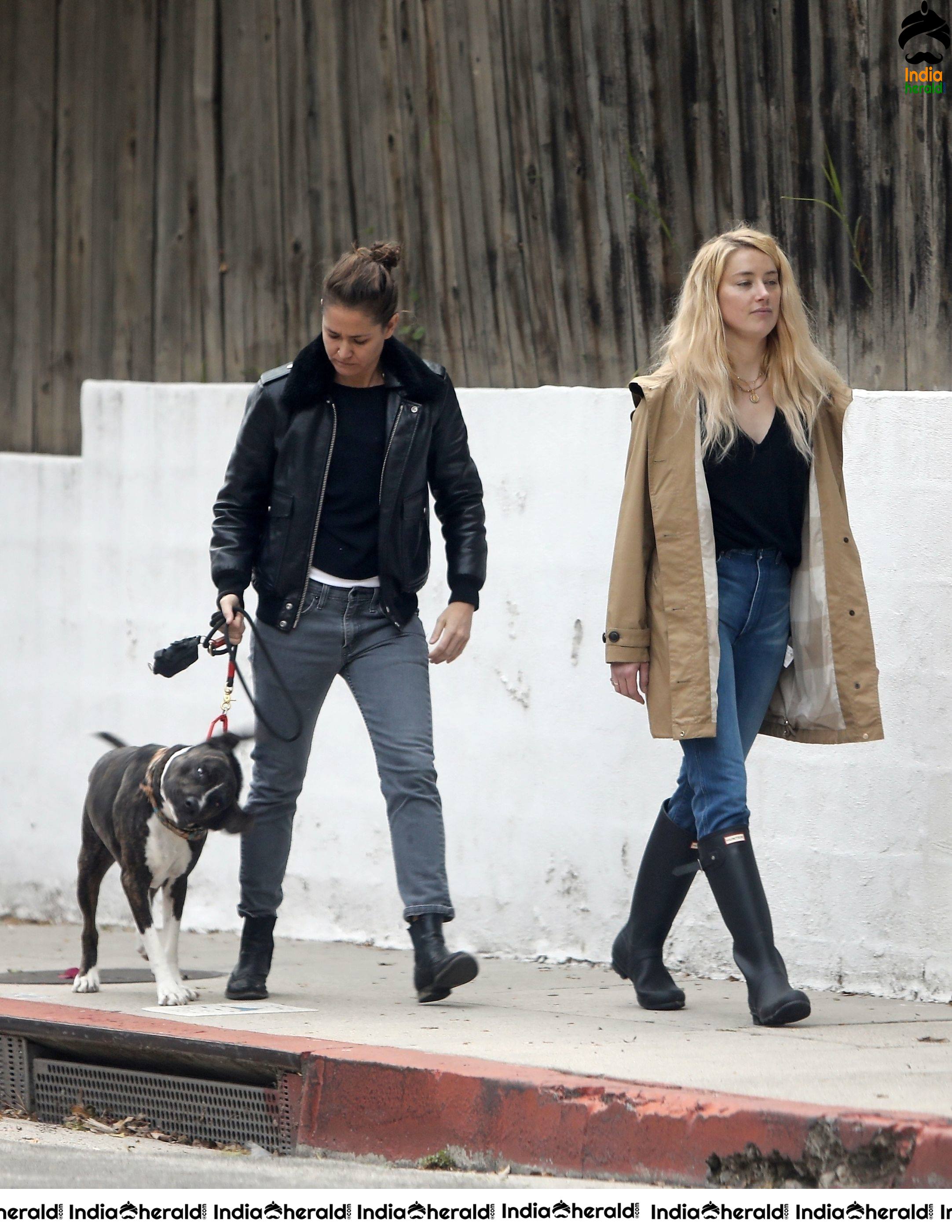 Amber Heard takes a break from isolation to walk Birdie with girlfriend Bianca Butti in LA