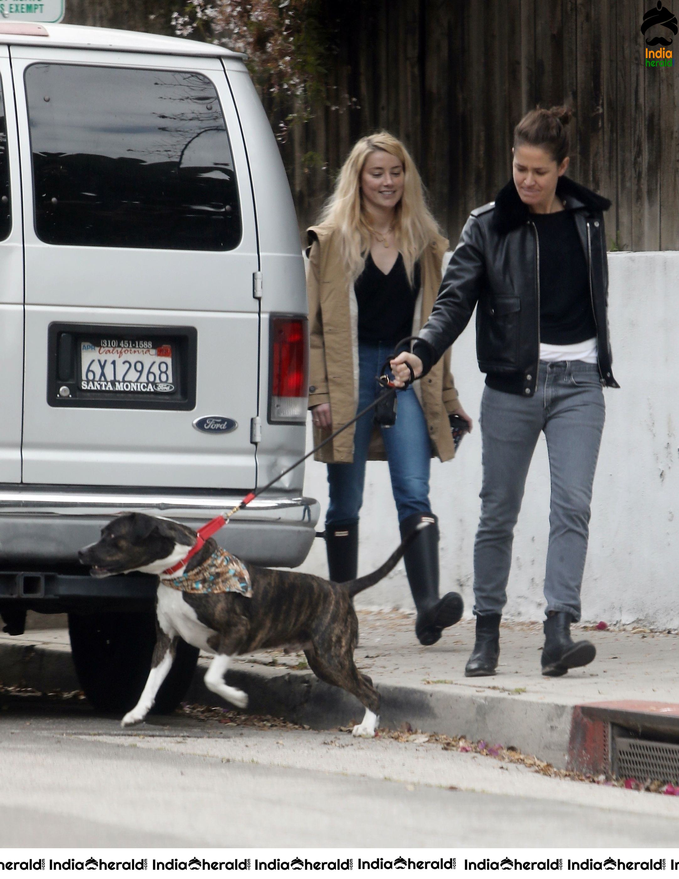 Amber Heard takes a break from isolation to walk Birdie with girlfriend Bianca Butti in LA