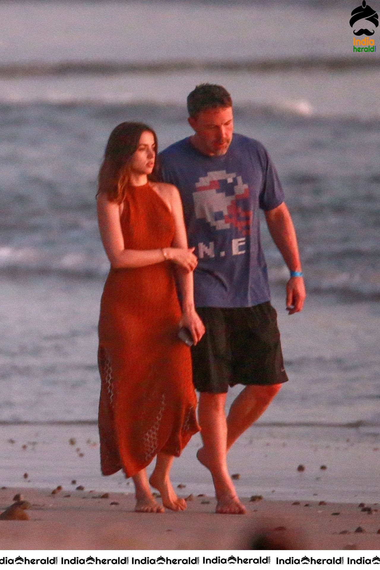 Ana De Armas enjoys a very romantic stroll in Sheer Red dress on the beach in Costa Rica