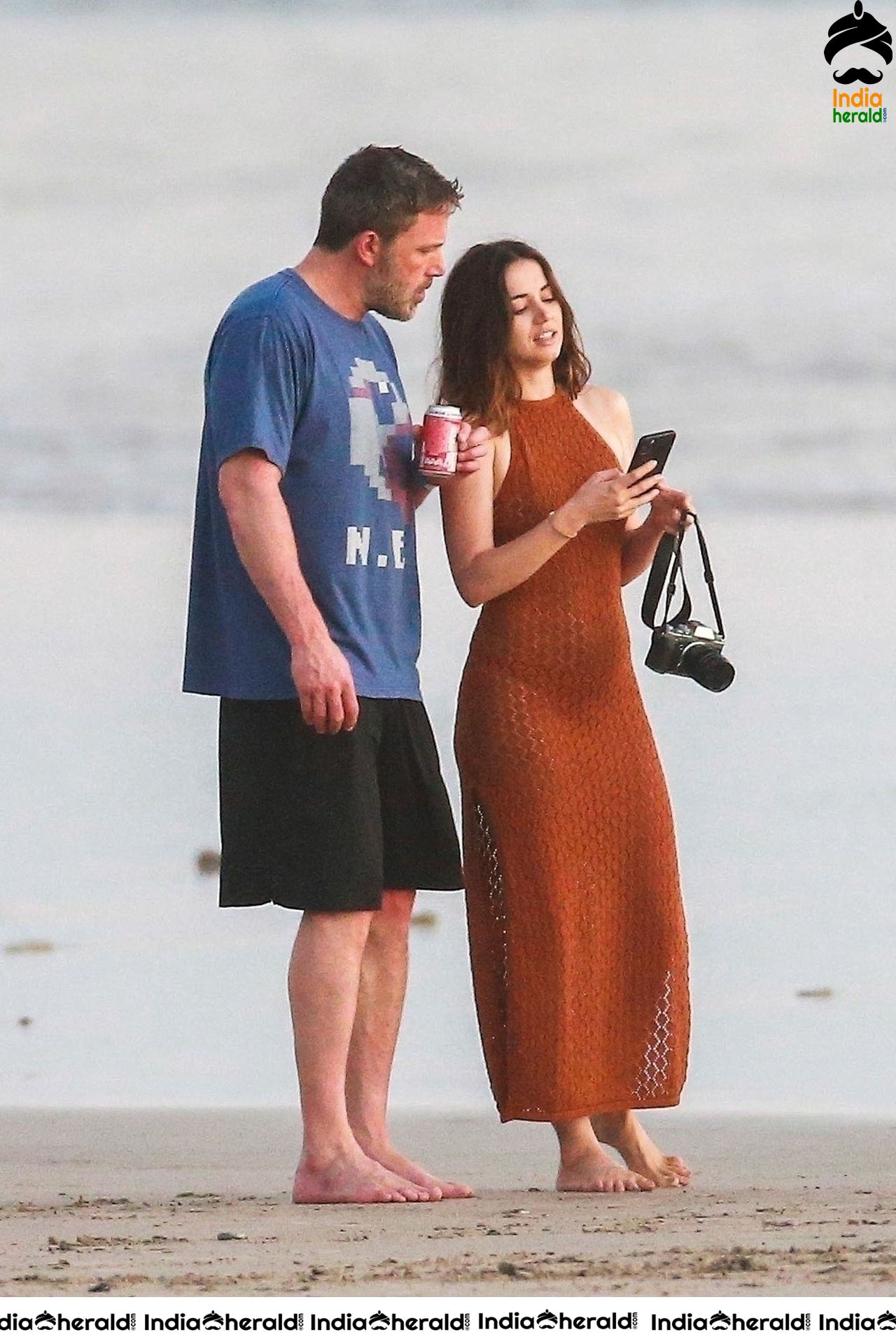 Ana De Armas enjoys a very romantic stroll in Sheer Red dress on the beach in Costa Rica