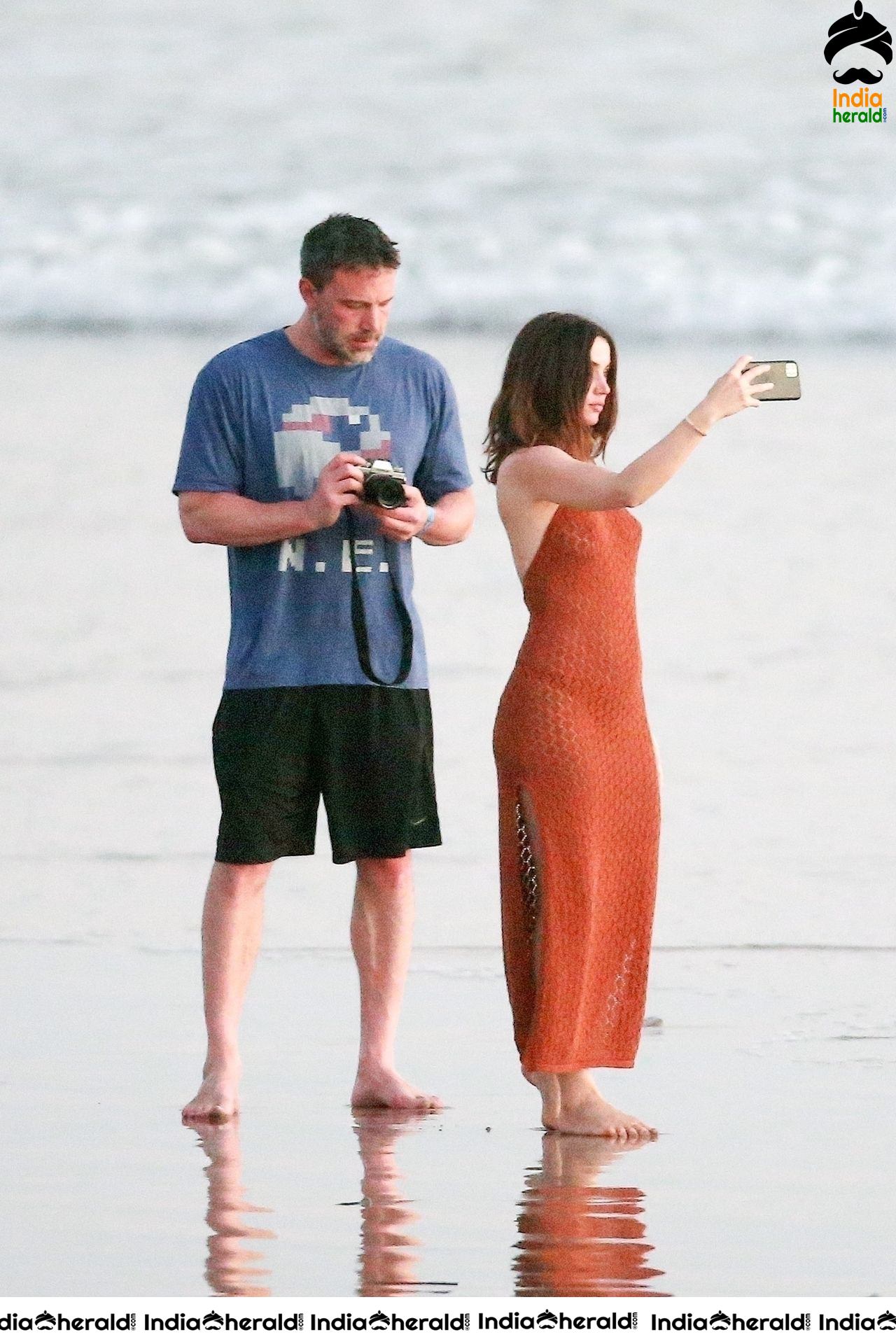 Ana De Armas enjoys a very romantic stroll in Sheer Red dress on the beach in Costa Rica