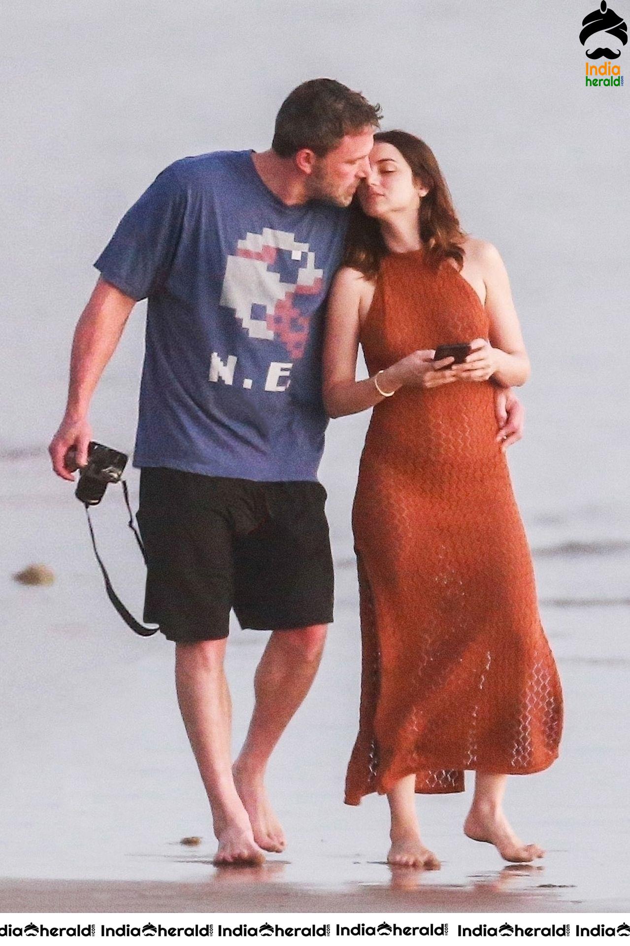 Ana De Armas enjoys a very romantic stroll in Sheer Red dress on the beach in Costa Rica