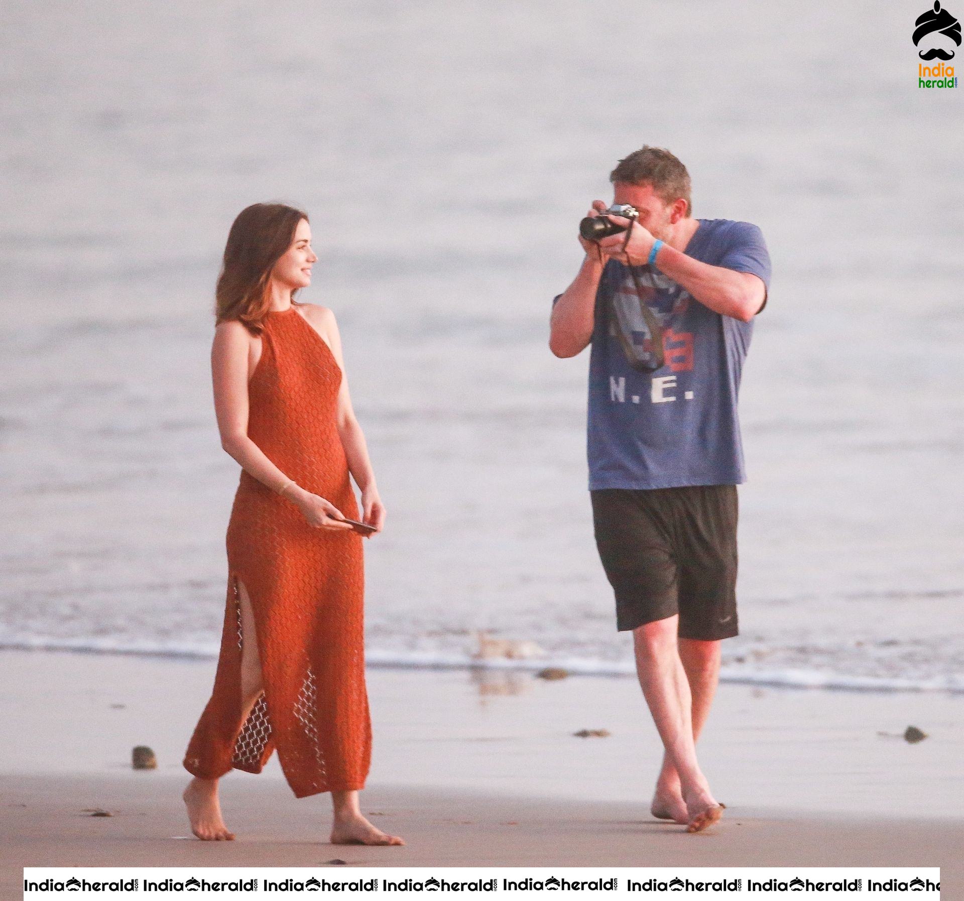Ana De Armas enjoys a very romantic stroll in Sheer Red dress on the beach in Costa Rica