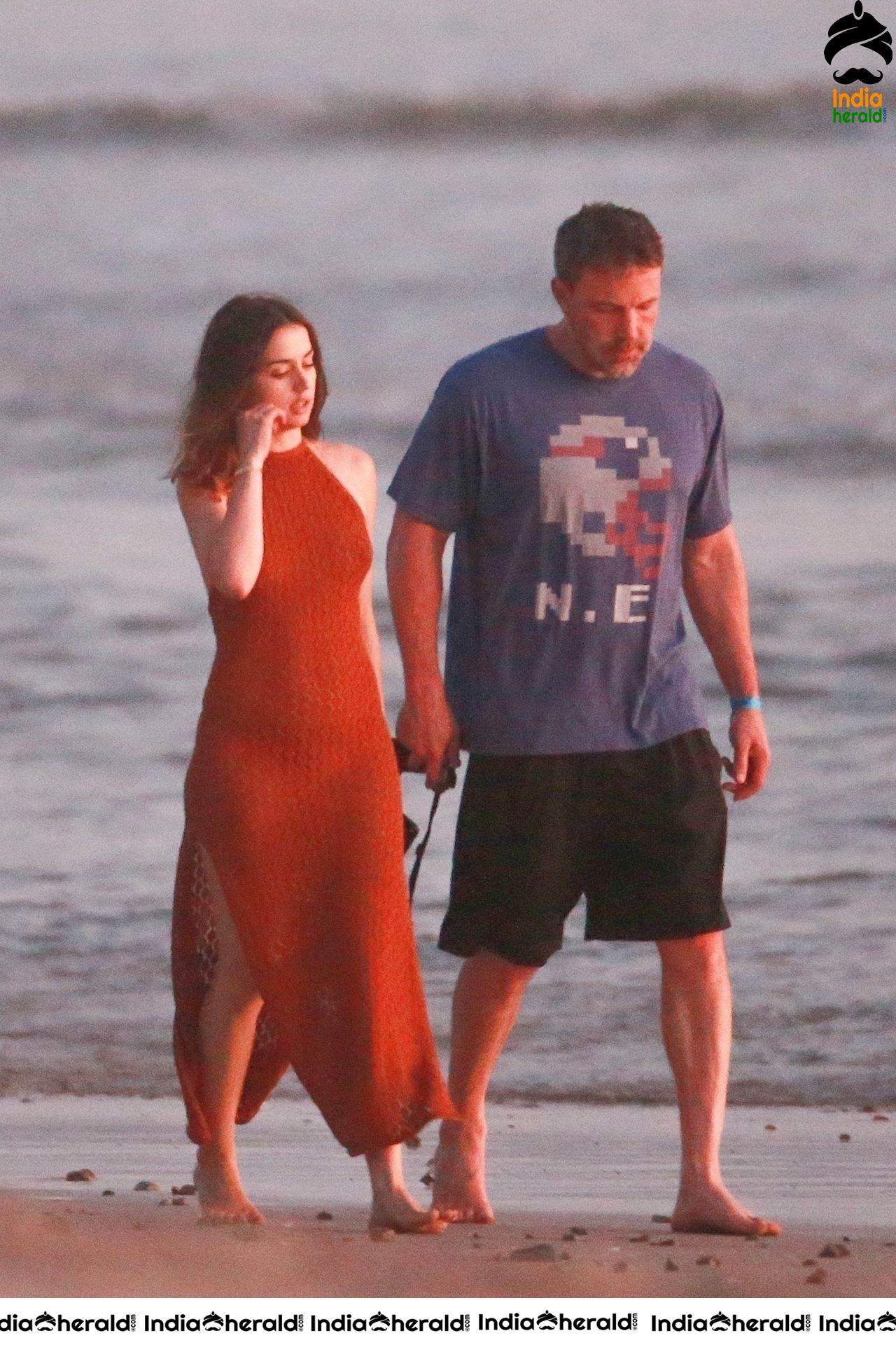 Ana De Armas enjoys a very romantic stroll in Sheer Red dress on the beach in Costa Rica