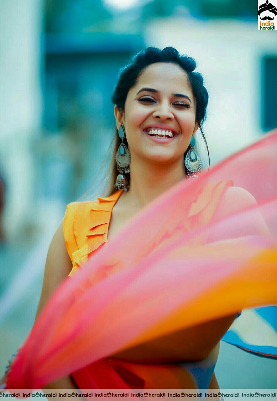 Anasuya Hot Orange Saree Stills