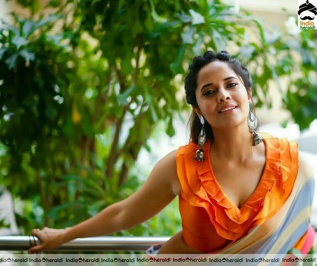 Anasuya Hot Orange Saree Stills
