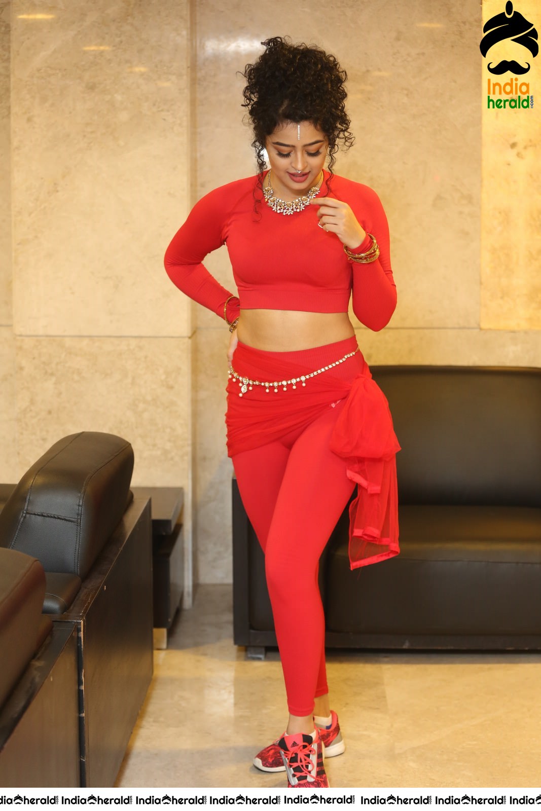 Ankeeta Shows her Teasing Waistline in Red Costume Set 2