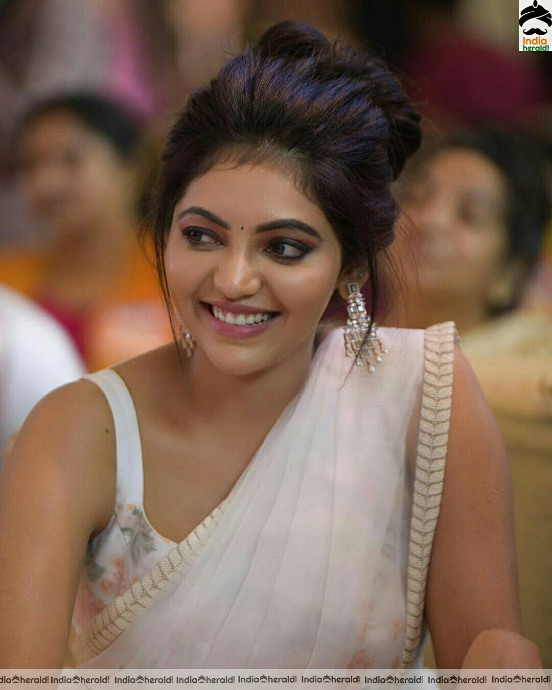 Athulya Cute Sleeveless Blouse white Saree Stills