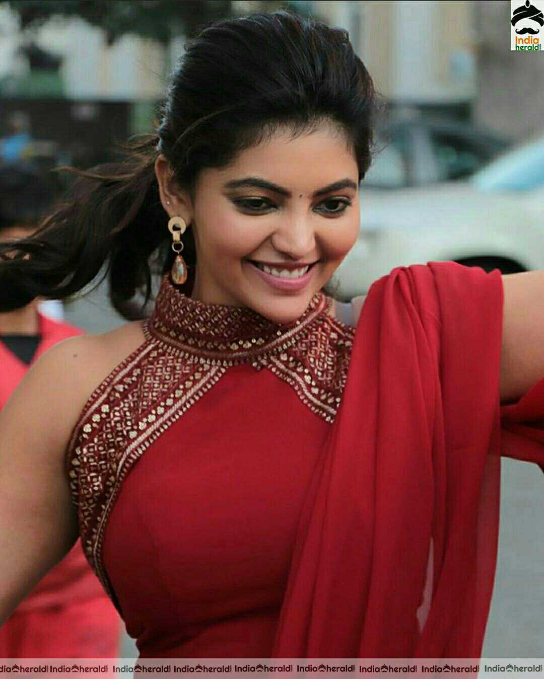 Athulya Hot And Cute Stills In Red Dress
