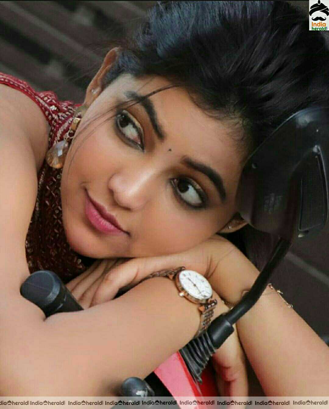 Athulya Hot And Cute Stills In Red Dress