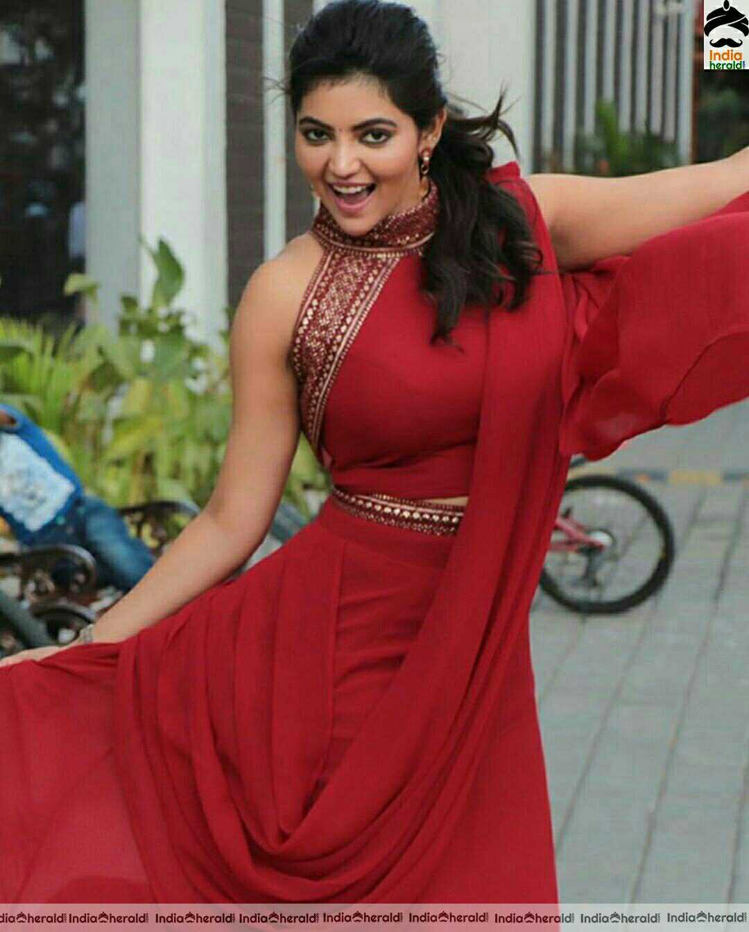 Athulya Hot And Cute Stills In Red Dress