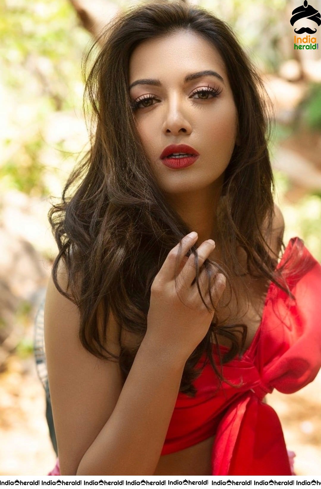 Catherine Tresa Hot In Red Brassiere Photos