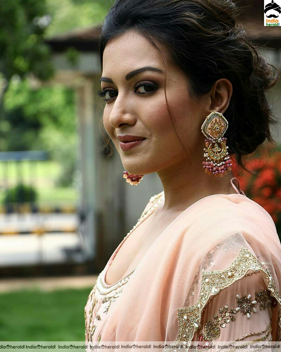 Catherine Tresa Looking Like a Golden Girl in Peach Color Dress