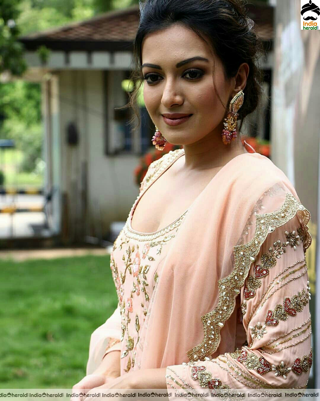 Catherine Tresa Looking Like a Golden Girl in Peach Color Dress