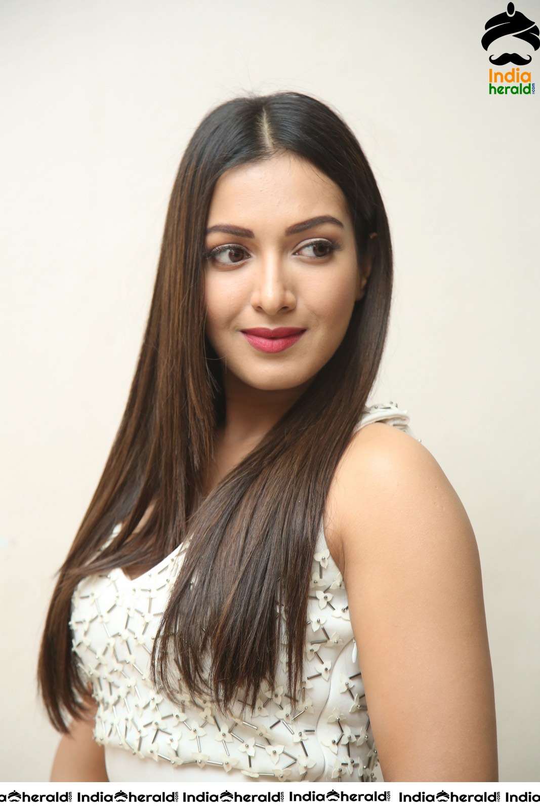 Catherine Tresa Looking Tempting Hot in White at Press meet of Vadaladu Set 5